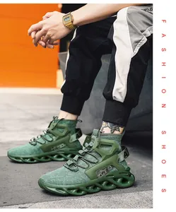 Detail of green knit running shoes featuring hollowed wave soles and TPU support