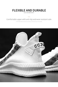Detailed macro view of white mesh running shoe featuring a wave-textured non-slip sole