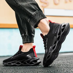 Men's breathable mesh sneakers with red accents and a hollow-carved shock-absorbing sole