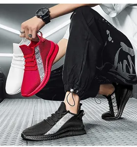 Close-up of men's mesh sneakers showing breathable texture and anti-slip rubber sole detail