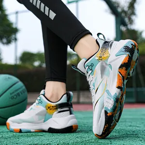 High-top white basketball shoes with blue and orange accents on a green court