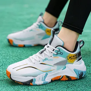 White high-top basketball shoes with blue and orange accents on a green grass field