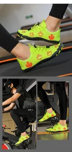 Macro view of breathable mesh outdoor shoes with maple leaf patterns and drainage sole