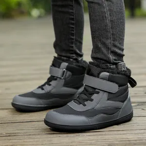 Winter barefoot snow boots for kids featuring warm plush lining and waterproof grey fabric