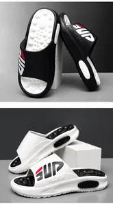 Detailed macro view of athletic sandals featuring massaged footbed and SUP branding design