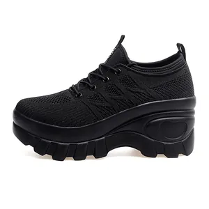Women's black breathable mesh walking shoes with thick wedge sole and slip-on design