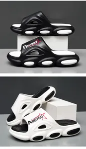 Detail of breathable hollow-out platform slides featuring dual-tone EVA soles and star logos