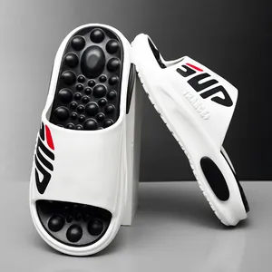 White EVA sports massage slides with black footbed dots and SUP logo for men