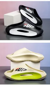 Detail of thick-soled EVA sports slides showing side hollow vents and SUP lettering
