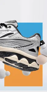 Close-up of thick wavy midsole and durable black rubber outsole of athletic running shoe