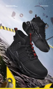 Dynamic splash shot showing high-top safety shoes with steel toe and shock-absorbing sole