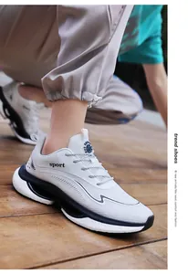Detailed macro view of white breathable mesh sneakers with wavy lines and thick sole