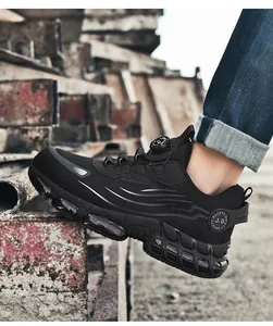 Macro detail of breathable black safety shoes with rotary dial laces and air cushion sole