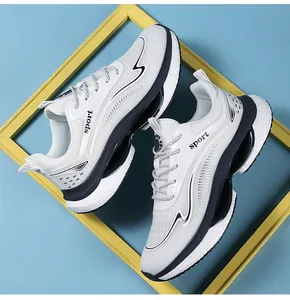 Detail of white breathable mesh sneaker with sport lettering and cushioned sole