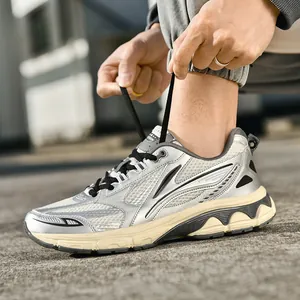 Retro silver chunky sneakers with mesh panels and thick beige wavy rubber soles for men