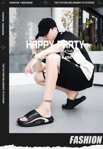 Detail of trendy EVA men's slides showing the comfortable thick sole and side logo design