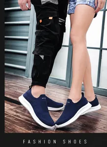 Macro detail of breathable navy blue mesh sneakers with thick white lightweight MD soles