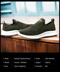 Detail of olive green flyknit upper and thick white MD sole on outdoor wooden surface