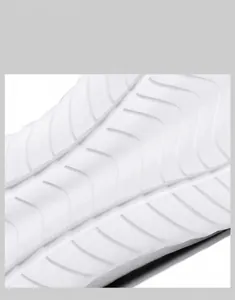 Macro detail of high-elastic MD sole showing anti-slip texture for walking shoes