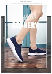Deep blue slip-on shoes featuring breathable fabric upper and thick white MD outsole