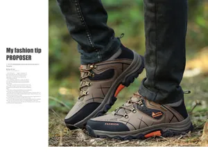 Close-up of hiking shoes featuring khaki mesh panels and durable metal eyelets