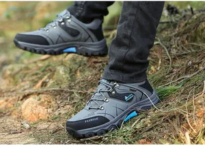 Close-up of durable outdoor hiking shoes with rubber non-slip sole in forest terrain