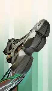Detail showing the segmented shock-absorbing sole and TPU support of this green running shoe