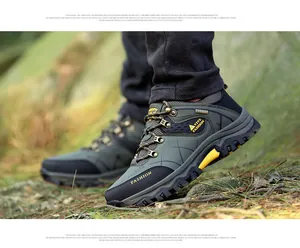 Outdoor men's hiking shoes featuring a deep-tread anti-slip rubber sole and metal eyelets