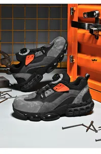 Industrial safety shoe with steel toe cap and quick-adjustment knob on site background