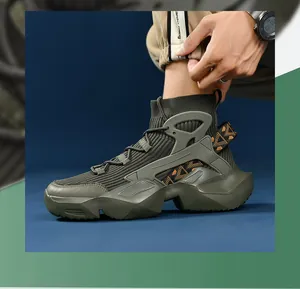 Detail view of military green high-top sock sneakers with breathable knit and geometric soles