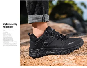 Close-up of durable non-slip lug sole on black outdoor hiking shoes for men