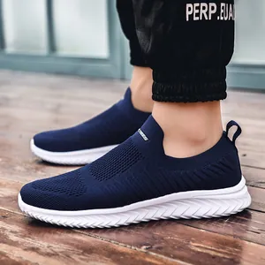 Men's navy blue breathable knit slip-on sneakers with white cushioned wave sole