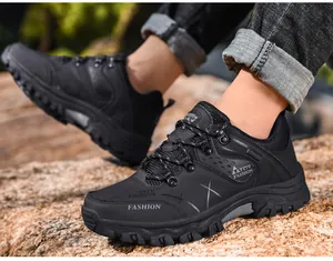 Detail of durable black outdoor hiking shoes featuring reinforced toe and non-slip rubber sole