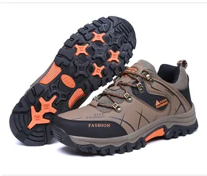 Detail of brown outdoor hiking shoes showing non-slip rubber sole and breathable mesh upper