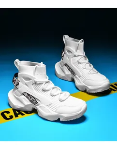Detail view of white high-top sock sneakers featuring a chunky sole and techwear accents