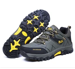 Outdoor hiking shoe with non-slip rubber sole and green synthetic mesh upper