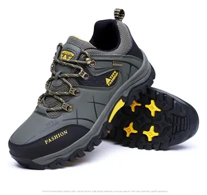 Detail of outdoor hiking shoes showing non-slip rubber soles and reinforced toe protection