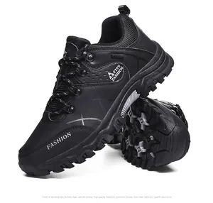 Detailed close-up of non-slip rubber sole and synthetic upper of men's outdoor shoes
