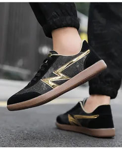 Detail of black canvas sneaker with suede trim and vintage gum sole for outdoor styling