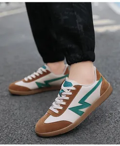 Retro low-top sneakers in brown suede and off-white leather with green lightning logo