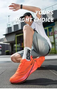 Close-up of vibrant orange mesh running shoes featuring 9PRO design and thick cushioned soles