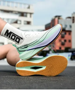 Macro view of mint green running shoe detailing the durable gum rubber outsole and 9PRO logo