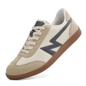 Retro low-top sneakers in beige leather and khaki suede with a brown rubber sole