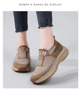 Detailed texture of women's breathable knit walking shoes in brown on-foot