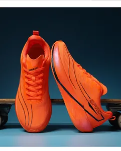 Detail of bright orange marathon running shoe with breathable mesh and 9PRO logo