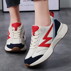Retro low-top casual sneakers in navy and beige with a vintage thick rubber sole