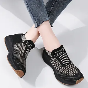 Women's black breathable knit sock sneakers with striped texture and durable rubber soles