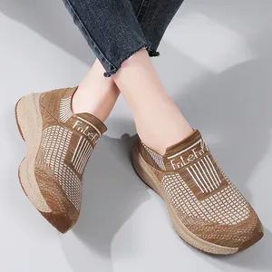 Women's lightweight breathable knit sneakers in brown and white with thick cushioned soles