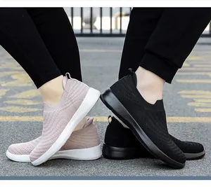 Close-up of breathable knit walking shoes with thick cushioned soles for seniors
