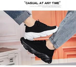 Detail showing breathable mesh fabric and chunky wave-patterned sole of casual sneakers